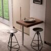 Just – Tilting table with single folding leg
